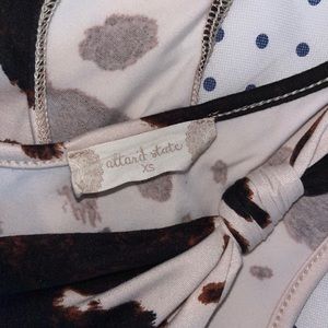 Altar’d State cow print body suit. Never worn. Size XS